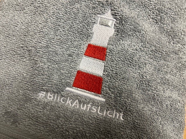 Handtuchgeschenk mit Leuchtturm #BlickAufsLicht